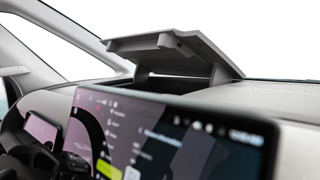Kia PV7 interior storage and screen detail