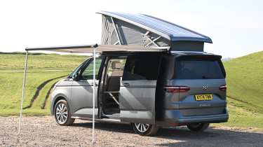 Volkswagen California - rear static with roof tent and awning up 