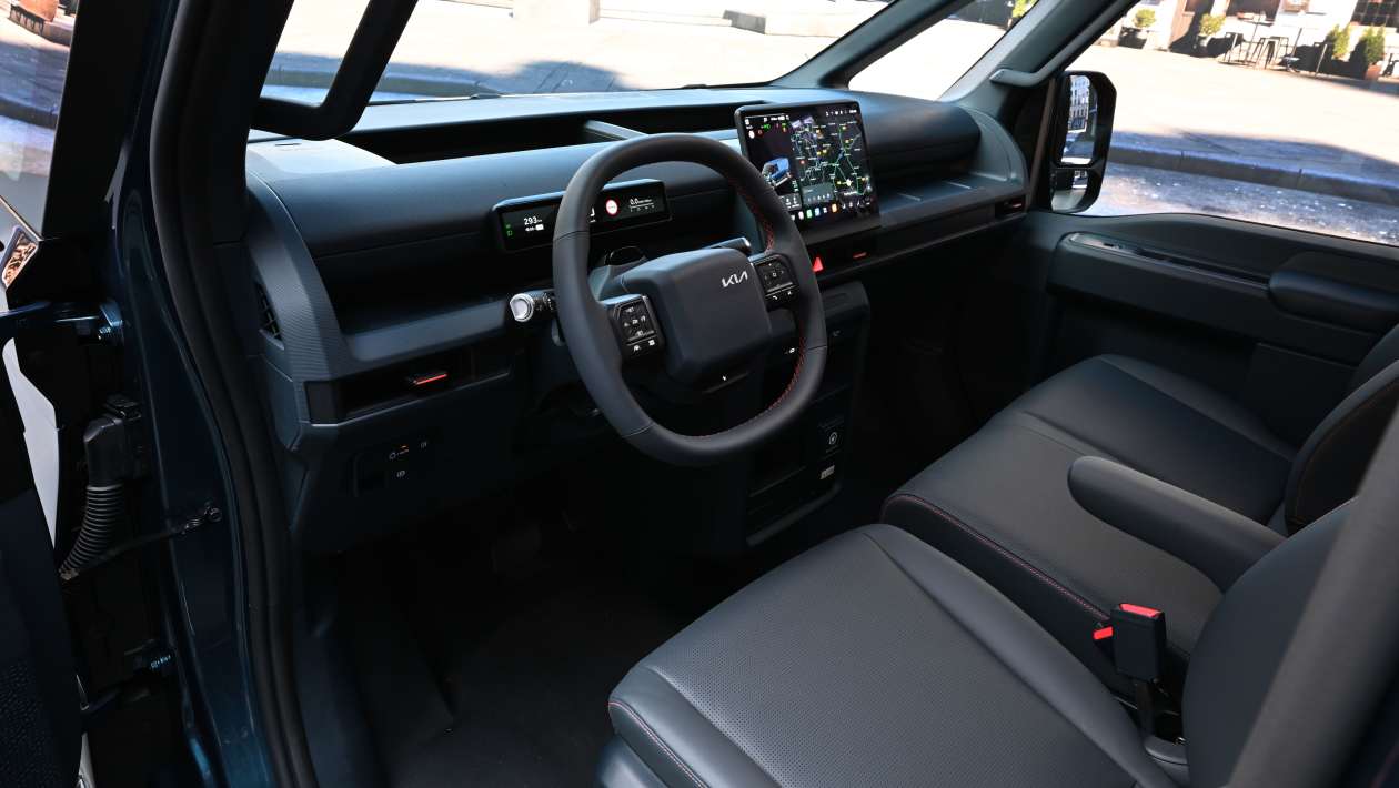 Kia PV7 front cabin seats and steering wheel