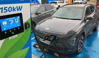 Hyundai Kona Electric connected to a rapid-charging station 