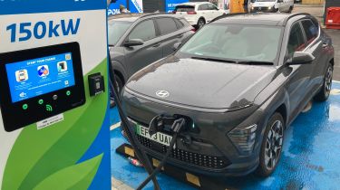 Hyundai Kona Electric connected to a rapid-charging station 