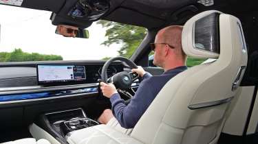 Alex Ingram driving the BMW i7