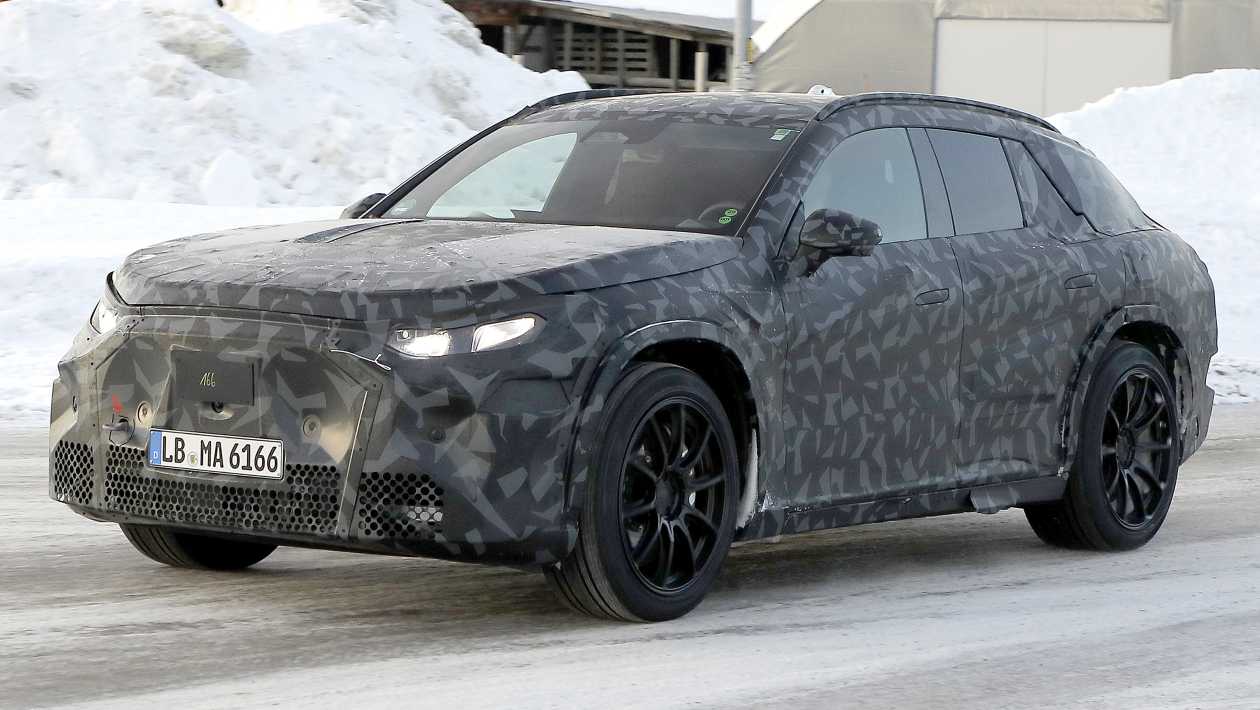 Angled front view of the Mercedes-AMG electric SUV prototype showing large brake calipers