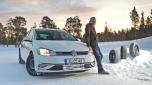 Auto express product tester John Barker standing next to a Volkswagen Golf