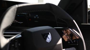 Electric car charging mega test - Peugeot steering wheel