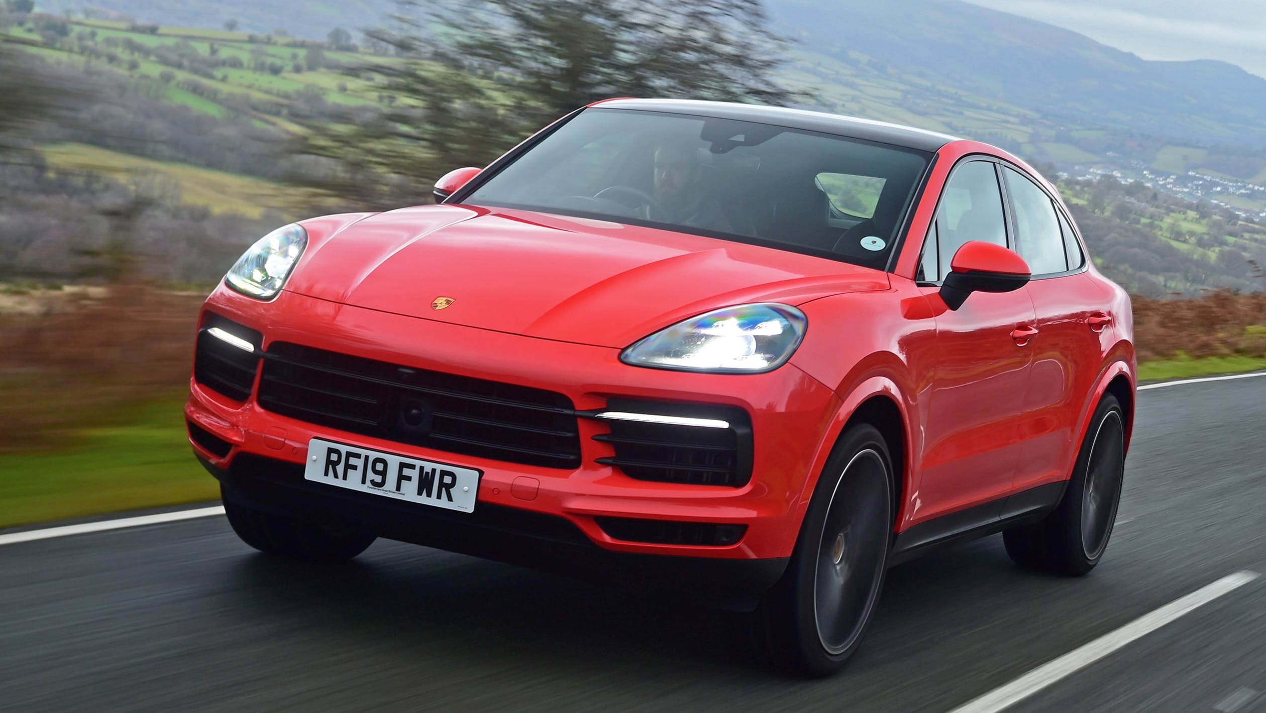 Porsche Cayenne Coupe vs Range Rover Sport - pictures | Auto Express