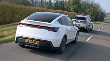 Premium electric SUV supertest - Tesla and BMW rear angled