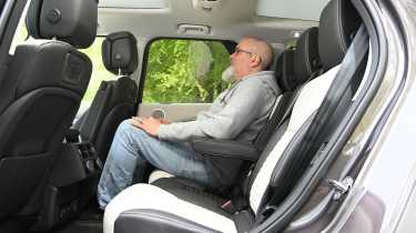 Auto Express senior test editor Dean Gibson sitting in the Land Rover Discovery Tempest's mid-row seat