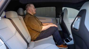 Polestar 4 - News reporter Ellis Hyde sitting in the rear seats