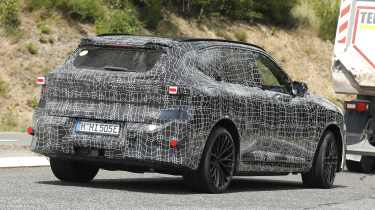 New BMW iX5 M - rear tracking