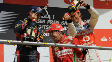 Sebastian Vettel, Fernando Alonso and Jenson Button on the podium