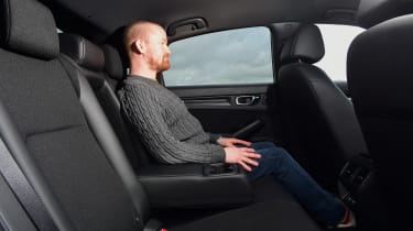 Honda Civic - rear seats, featuring Alex Ingram