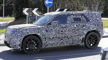 New Land Rover Defender Sport spy shot - front cornering 