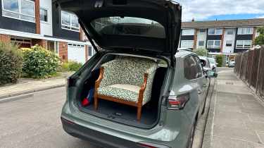 Volkswagen Tiguan with armchair in boot