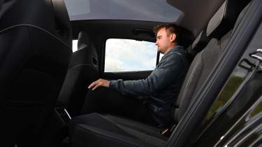 Alastair Crooks sat in the Skoda Enyaq Coupe
