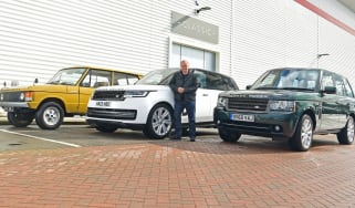Auto Express editor-in-chief Steve Fowler standing with multiple generations of Range Rover