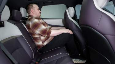 Ellis Hyde sat in the rear seats of the Mazda CX-6e