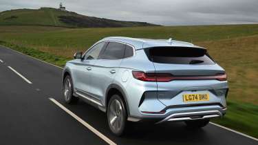 BYD Seal U - rear shot with a lighthouse in the distance