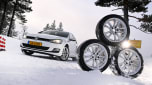Winter tyre test 2025 - header image, tyres next to a Volkswagen Golf