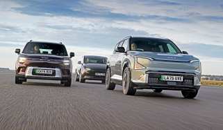 Tesla Model Y, Kia EV5, and Smart #5 - front angled