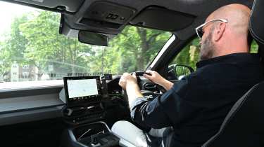 Auto Express creative director Darren Wilson driving the Dacia Bigster