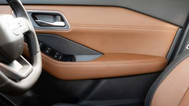 2026 Nissan X-Trail - beige door card