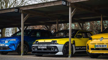 Renault 5 Turbo 3E parked in between an Alpine A290 and Renault 5