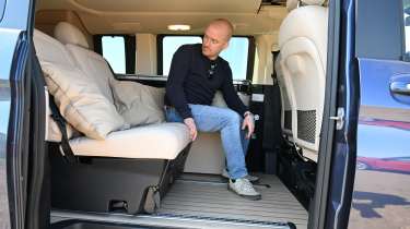 Mercedes Marco Polo - Auto Express chief reviewer, Alex Ingram, folding the rear seats to create the bedding area 