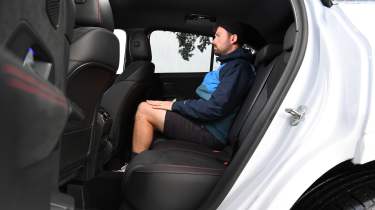 Auto Express photographer Otis Clay sitting in the Mercedes GLA&#039;s rear seat