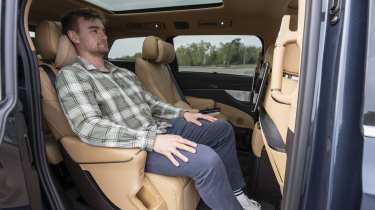 New Denza D9 - Auto Express senior news reporter Alastair Crooks sat in the middle row captains chairs 