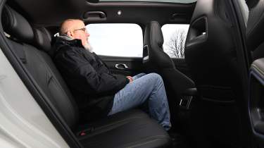 Auto Express senior road test editor Dean Gibson sitting in the BYD Atto 2's back seat
