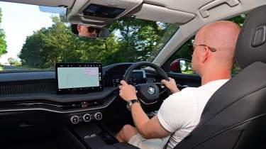 New Skoda Superb UK drive - interior, car being driven by Auto Express chief reviewer Alex Ingram