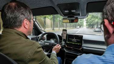 Dacia CEO Denis Le Vot driving the Dacia Duster