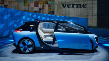 Verne self-driving robo-taxi - side view with door open