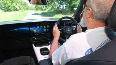 Mercedes GLB electric - interior driving shot with senior test editor, Dean Gibson