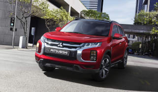 Mitsubishi ASX driving through a city