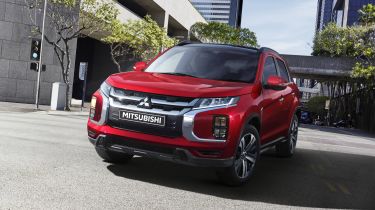 Mitsubishi ASX driving through a city