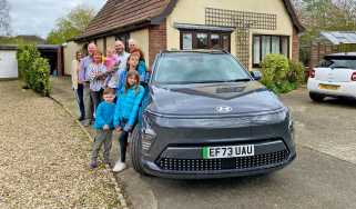 Auto Express creative director Darren Wilson&#039;s family standing next to the Hyundai Kona