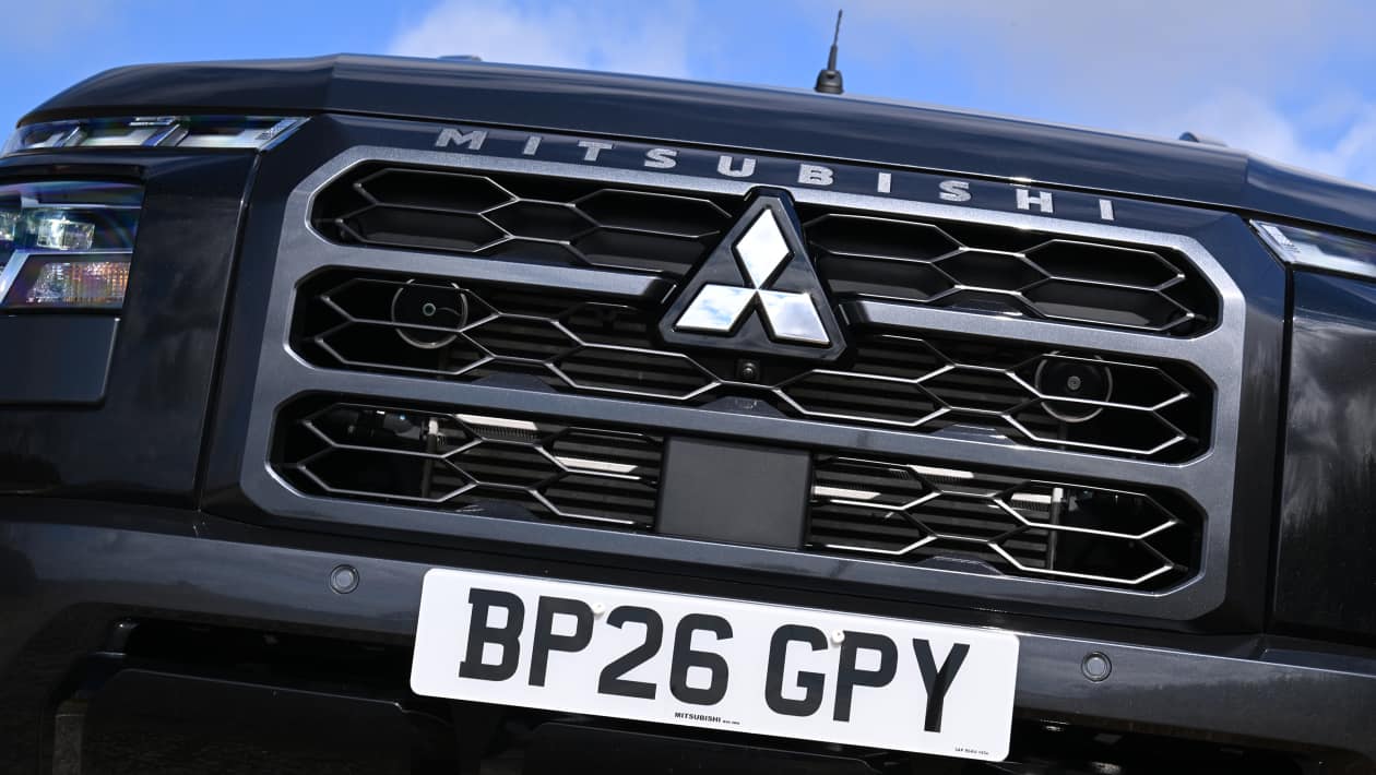 Mitsubishi L200 front view showing angular grille and LED headlights