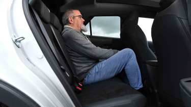 Toyota C-HR - rear seats with senior test editor, Dean Gibson
