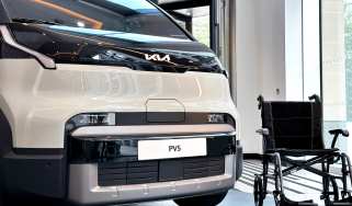 New Kia PV5 WAV - front end with wheelchair
