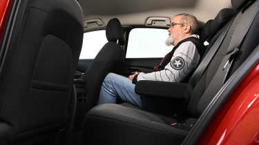 Auto Express senior test editor Dean Gibson sitting in the Mazda CX30&#039;s back seat