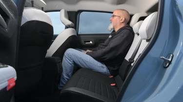 Auto Express senior road test editor Dean Gibson sitting in the Citroen C3's rear seat