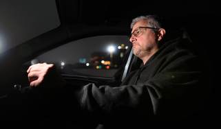 Auto Express consumer editor Chris Rosamond driving at night