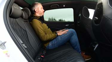 Richard Ingram sitting in the BYD Seal