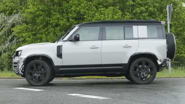 Land Rover Defender (camouflaged) - side
