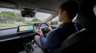 Auto Express senior news reporter Alastair Crooks driving the Toyota Prius