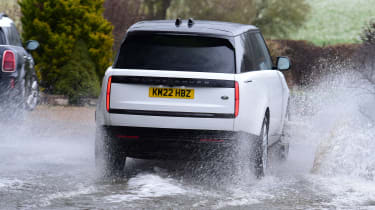 Range Rover - rear action (driving through ford)