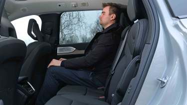 Volvo EX90 - rear seats with Senior news reporter, Alastair Crooks