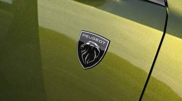 Peugeot E-408 - 'Peugeot' badge